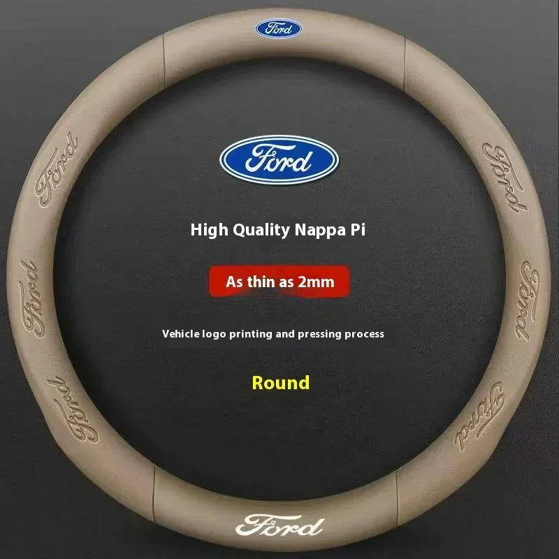 A round, beige steering wheel cover with a Ford logo printed on it.