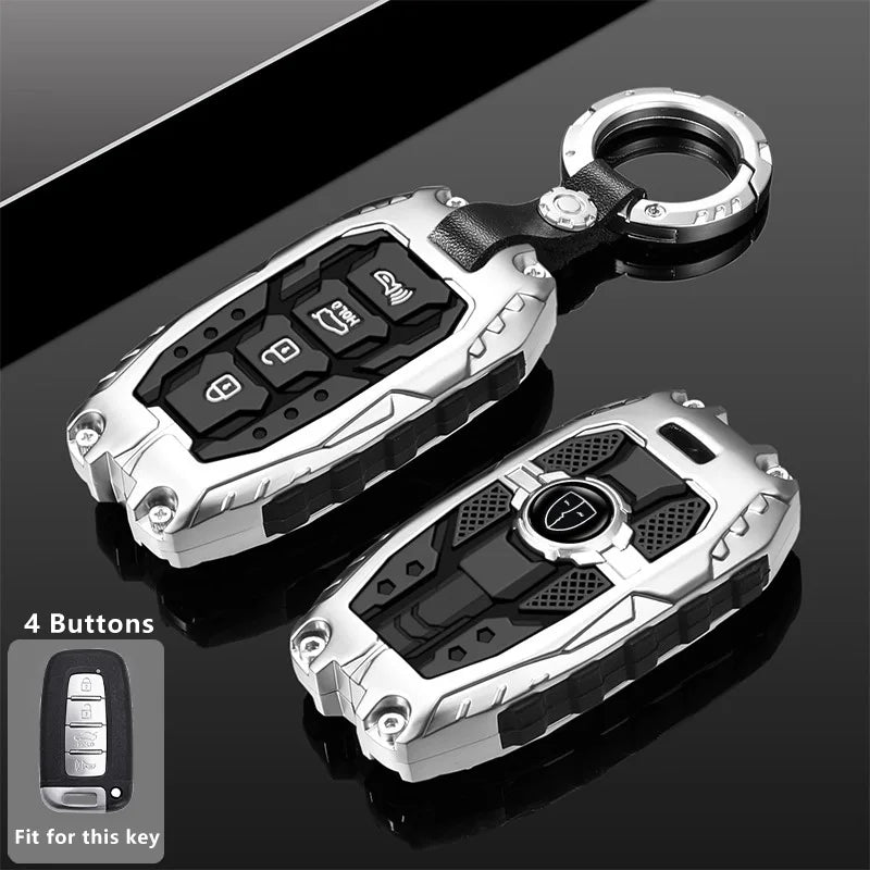 Silver key fob cover with four buttons shown next to the original key for Hyundai/Kia models