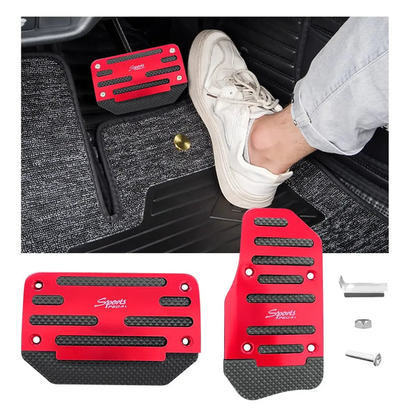 A set of red and black aluminum foot pedals shown in use inside a car
