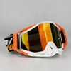 Orange and white off-road motorcycle riding goggles with yellow tinted lenses