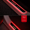 Close-up of a red logo display light on a door sill, showing a loading effect.