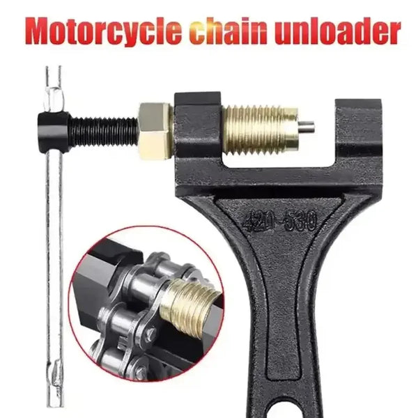 A black motorcycle chain unloader tool with a metal rod and a specialized jaw for breaking chains.