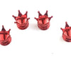 Trois bouchons de valve universels rouges et brillants pour roues, présentés sur fond blanc.