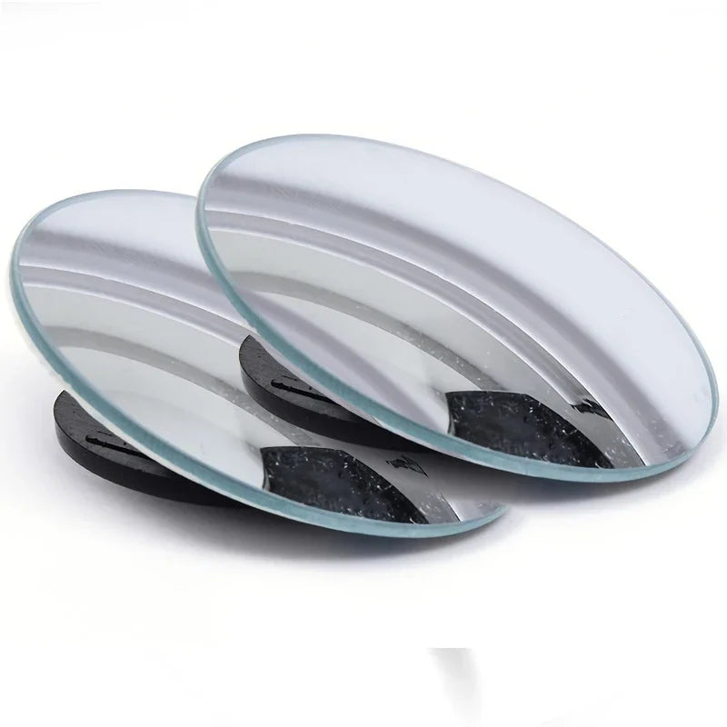 A pair of clear, oval-shaped convex blind spot rearview mirrors.