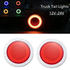 Two round red LED truck tail lights with a 3D halo effect.
