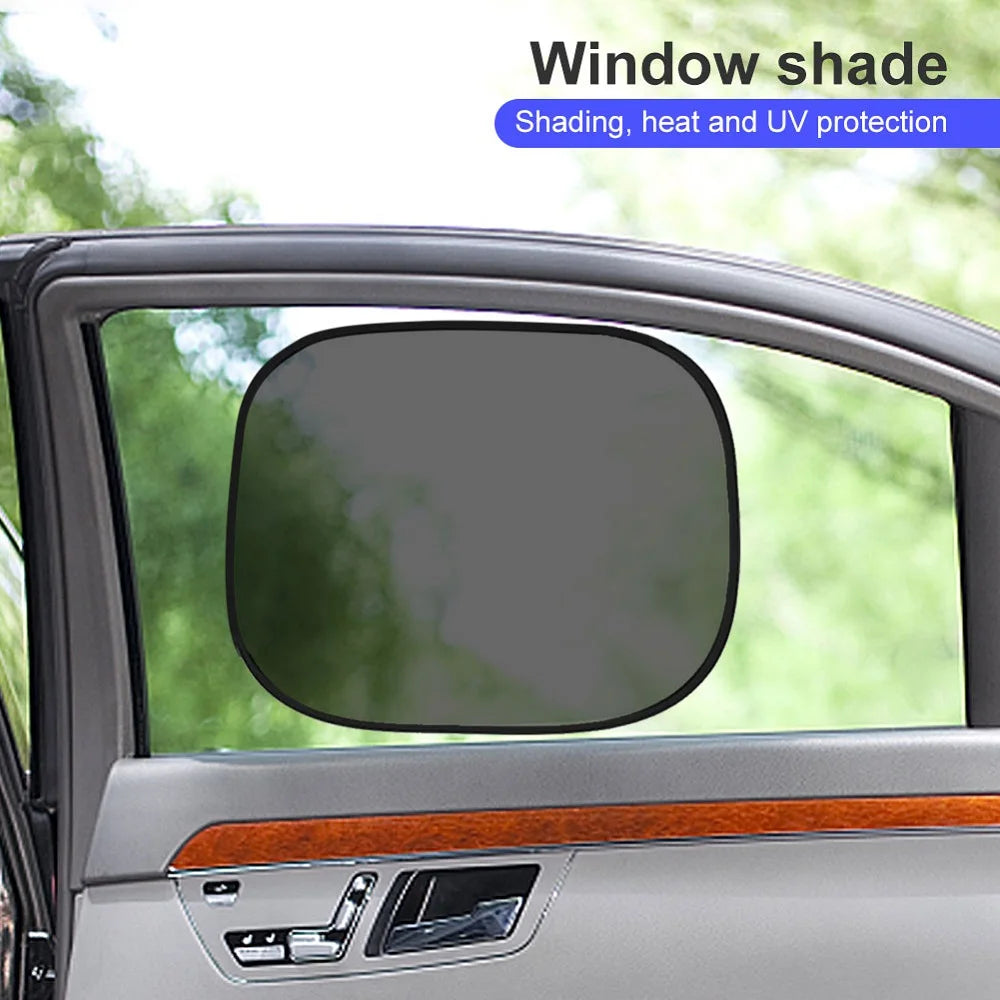 A window shade is installed on a car window, showing the interior view and exterior foliage.