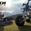 A blue LINGOI RACING motorcycle with large tires and custom features is shown in a scenic outdoor setting.