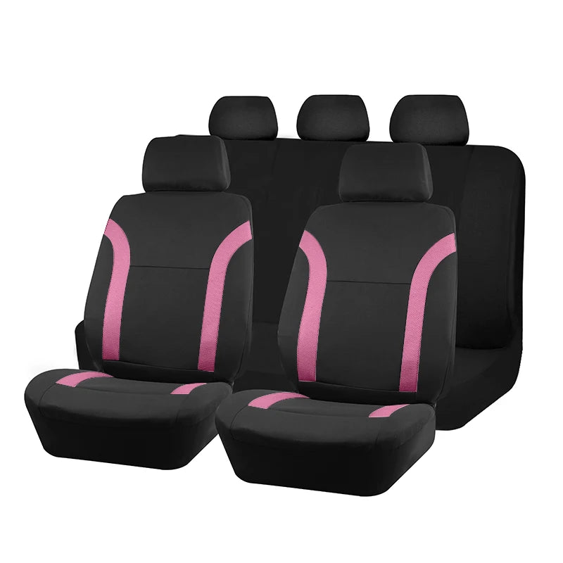 Eine Reihe schwarzer Autositzeinlagen mit rosa Akzenten.