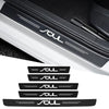 Black carbon fiber door sill protector with a custom SOL logo design