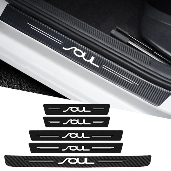 Black carbon fiber door sill protector with a custom SOL logo design