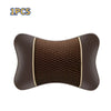 A brown ergonomic leather headrest and neck support cushion with a textured surface.
