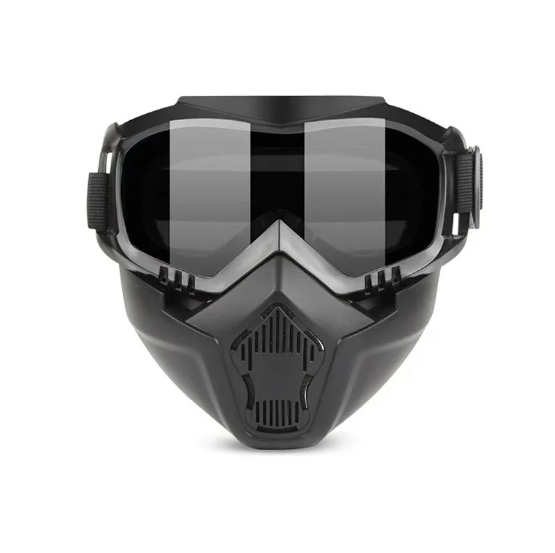 A black retro motorcycle anti-fog pair of goggles with a protective visor and side straps.