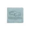 A light blue leather document holder featuring a line drawing of a car and the text Registration & Insurance.