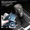 A crystal rhinestone gear shift knob cover in black PU leather is shown being placed onto a car gear shift.
