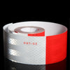 Roll of high-visibility reflective safety tape with white and red stripes and the text DOT C2