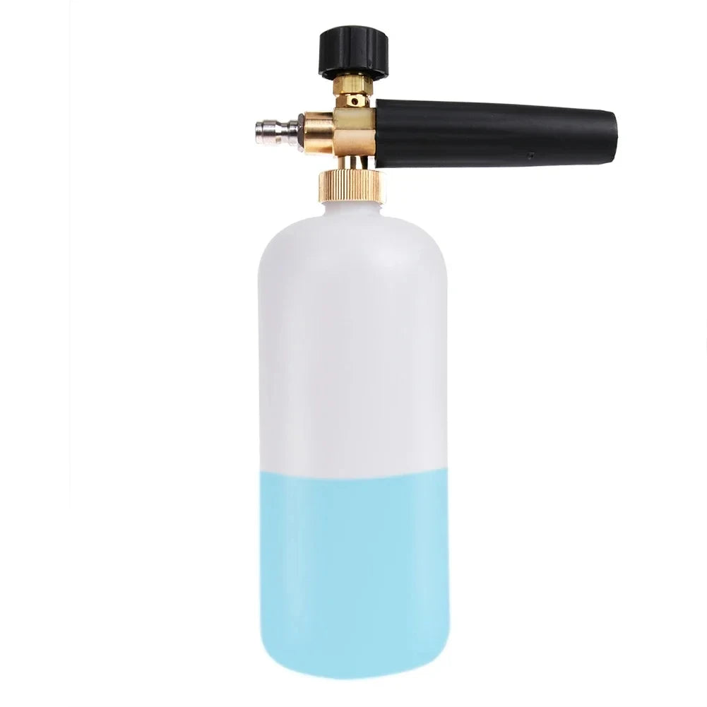 A clear and light blue bottle of high-pressure car cleaning foam with a black gun attachment.