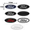 A set of Ford front hood emblems in various finishes including chrome, black, and red.
