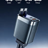 A close-up shot of a black retractable car charger plugged into a vehicle battery connection.