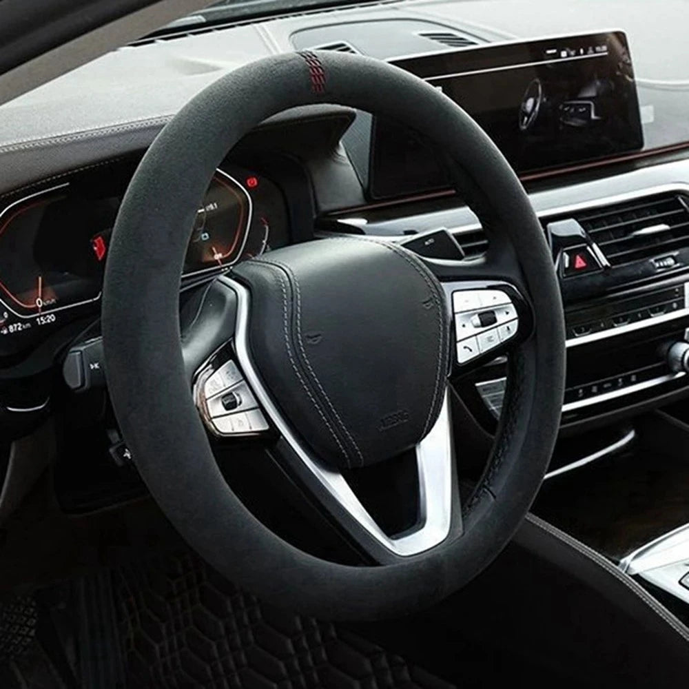 Black cowhide suede steering wheel covers for a VW Golf, Passat, or Polo car interior.