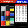 A box of 580 pieces of various colored heat shrink tubing, including black, yellow, blue, and red, packaged in clear plastic.