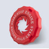 A red decorative ignition cover shaped like an engine start button.