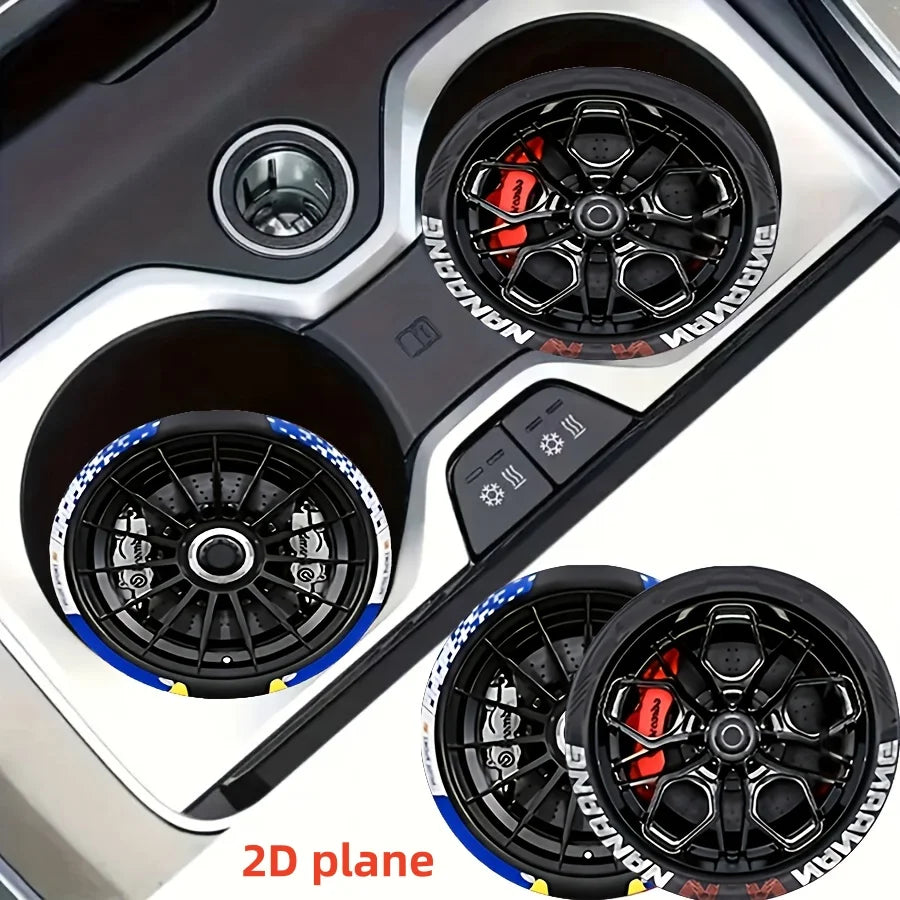 Close-up view of a silver car-shaped silicone coaster with a black racing wheel hub design.