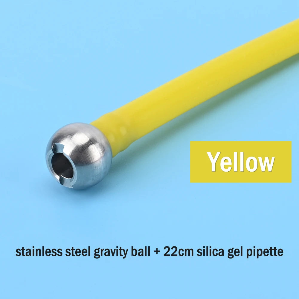 A yellow silicone gel pipette attached to a stainless steel gravity ball for fluid transfer.