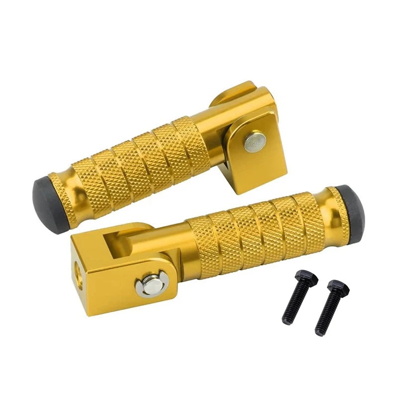 A pair of gold-colored foldable aluminum alloy foot pegs with textured grips and mounting hardware.