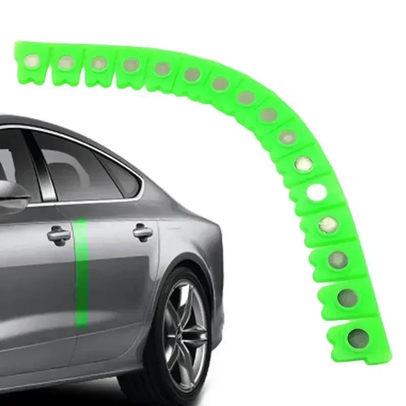 A bright green magnetic strip for car sheet metal dry grinding used on a silver car body.