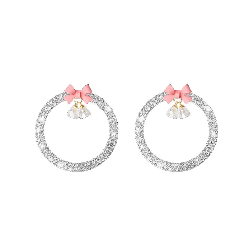 Pair of decorative rhinestone bow bell car start switch button trim in silver tone