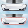 A close-up view of a silicone rearview mirror edge protector in pink and gray colors.