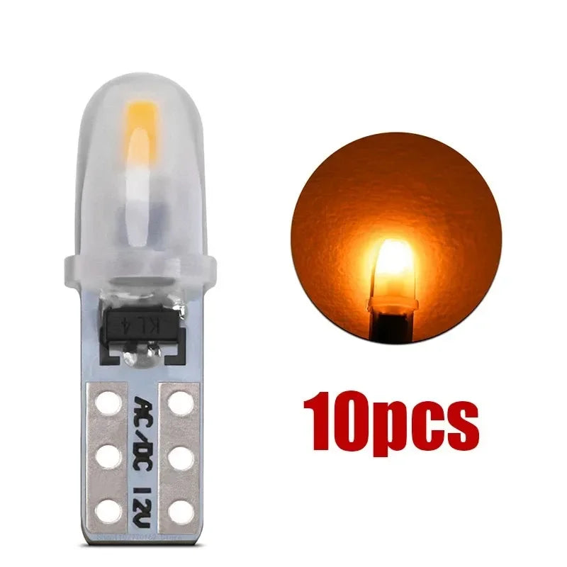 A set of 10 T5 LED dashboard and license plate bulbs, including a single bulb and a group of ten bulbs.