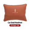 Orange car seat headrest neck support pillow with Lincoln logo