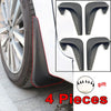 Set of four black universal mud flaps designed for car wheel protection.