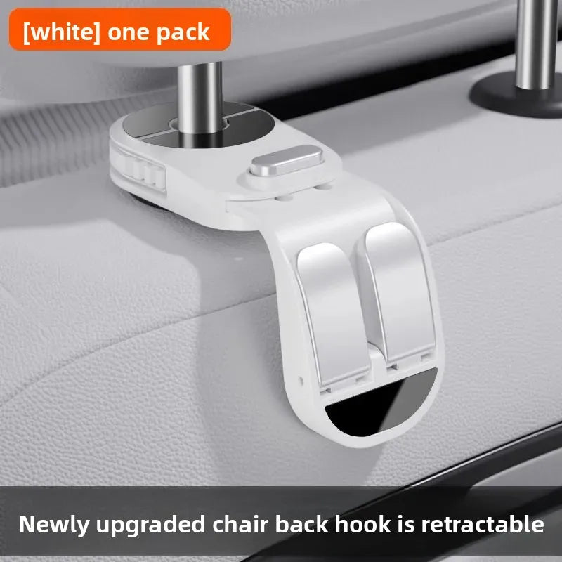 White retractable chair back hook mounted on a car seat organizer.