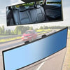 Wide angle convex rearview mirror showing the car interior and a view of the road.