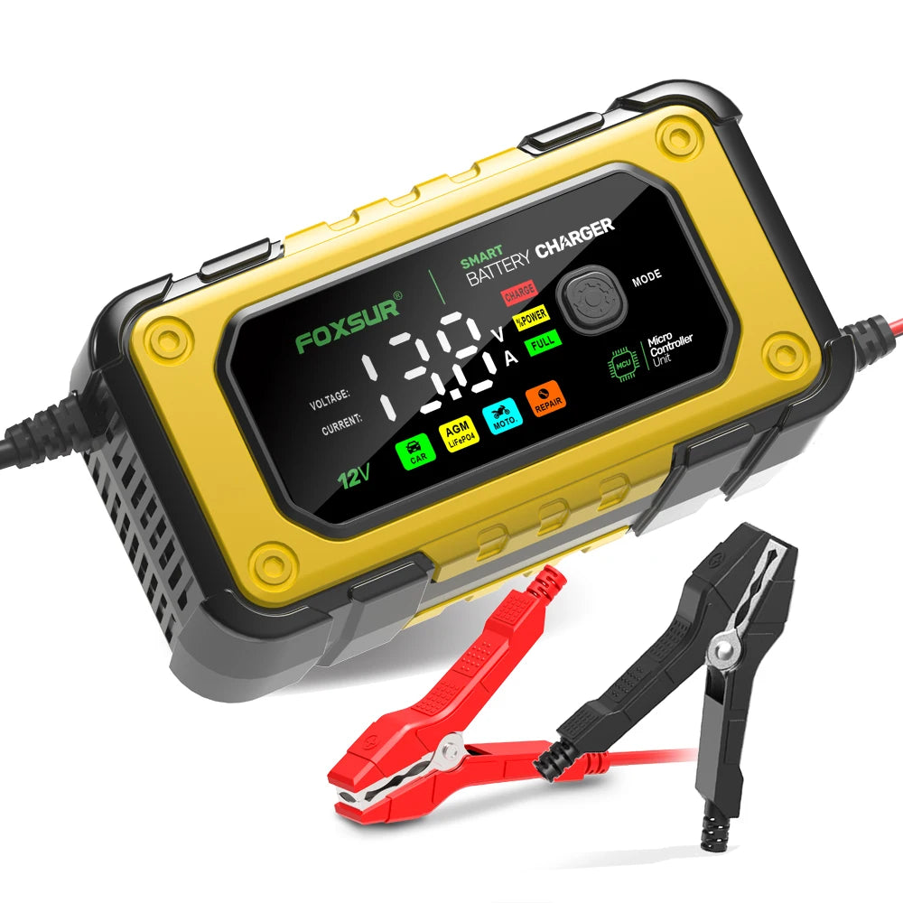 A yellow Foxsur smart battery charger device with a red clamp accessory shown on a white background.