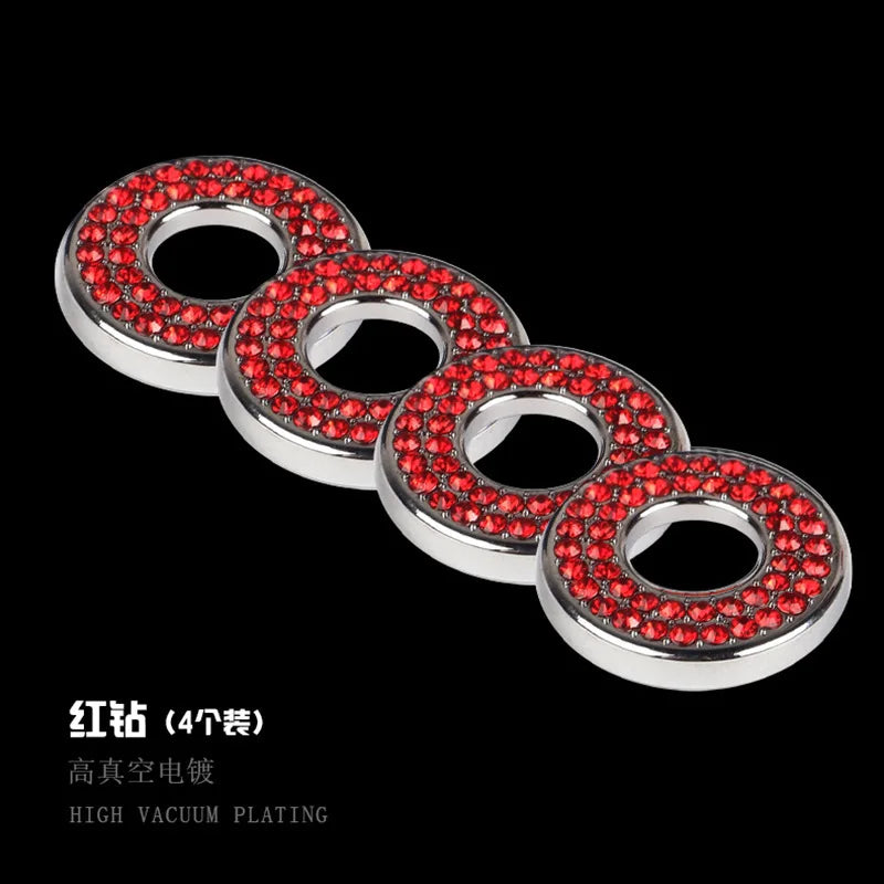 Four shiny silver door lock decorations adorned with red rhinestones