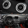 Close-up view of the interior air vent trim covers and steering wheel of an Audi A3 car interior.