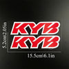 Two red KYB racing suspension decals displayed on a black background.