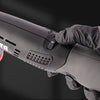A hand holds a black cordless mini car detail polisher tool.