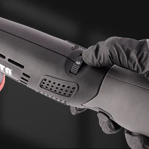 A hand holds a black cordless mini car detail polisher tool.