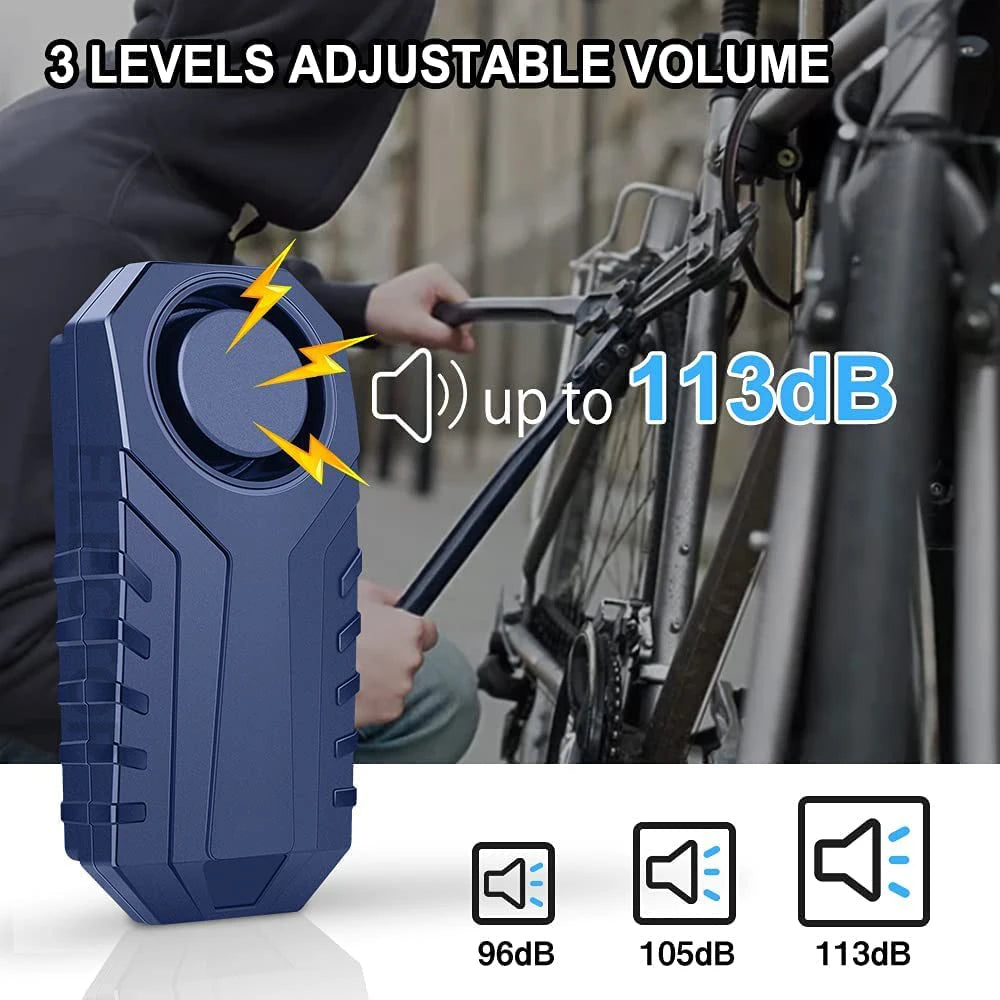 A blue portable alarm device with three adjustable volume levels is shown next to a bicycle frame.