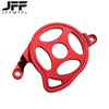 A red motorcycle engine case protector cover with multiple circular openings.