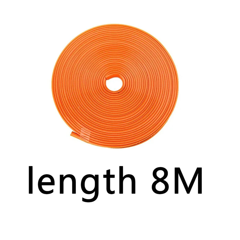 Orange universal car rim protector strip coiled on a white background.