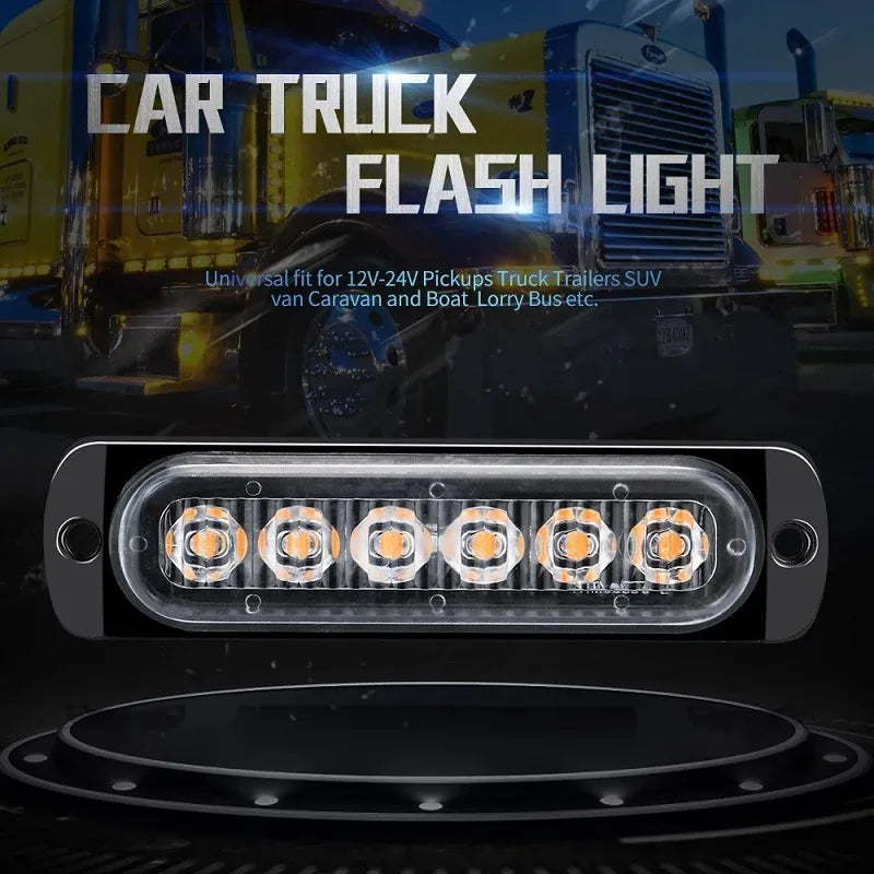 Gros plan d'un phare LED brillant de camion monté sur la grille d'un véhicule.