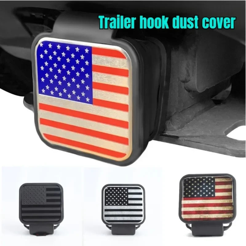 A close-up view of a black trailer hook dust cover featuring a patriotic American flag design.