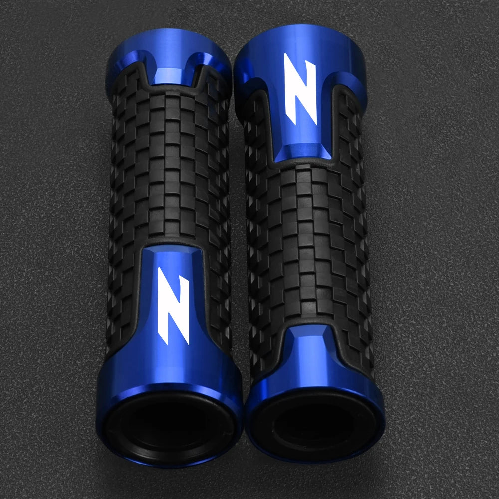 A pair of blue and black motorcycle lever and handguard protector set components.