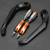 A set of motorcycle lever and handguard protectors featuring black carbon fiber grips and metallic fittings.