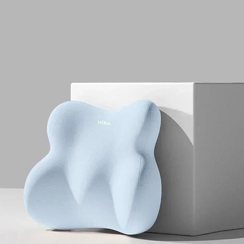 Light blue ergonomic memory foam pillow designed for car neck and lumbar support.